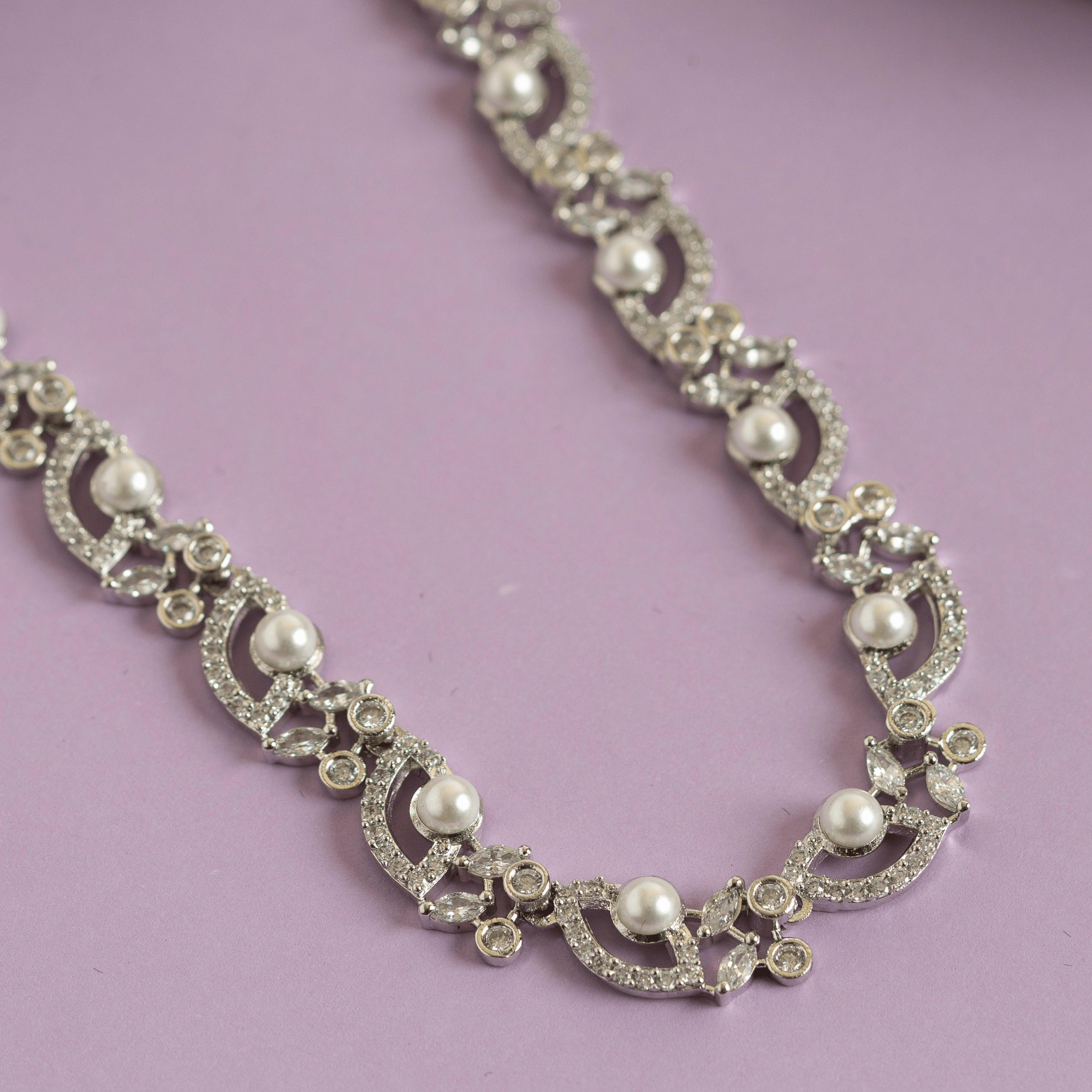 Set of white pearl unique pendant and earring - Rukhmani