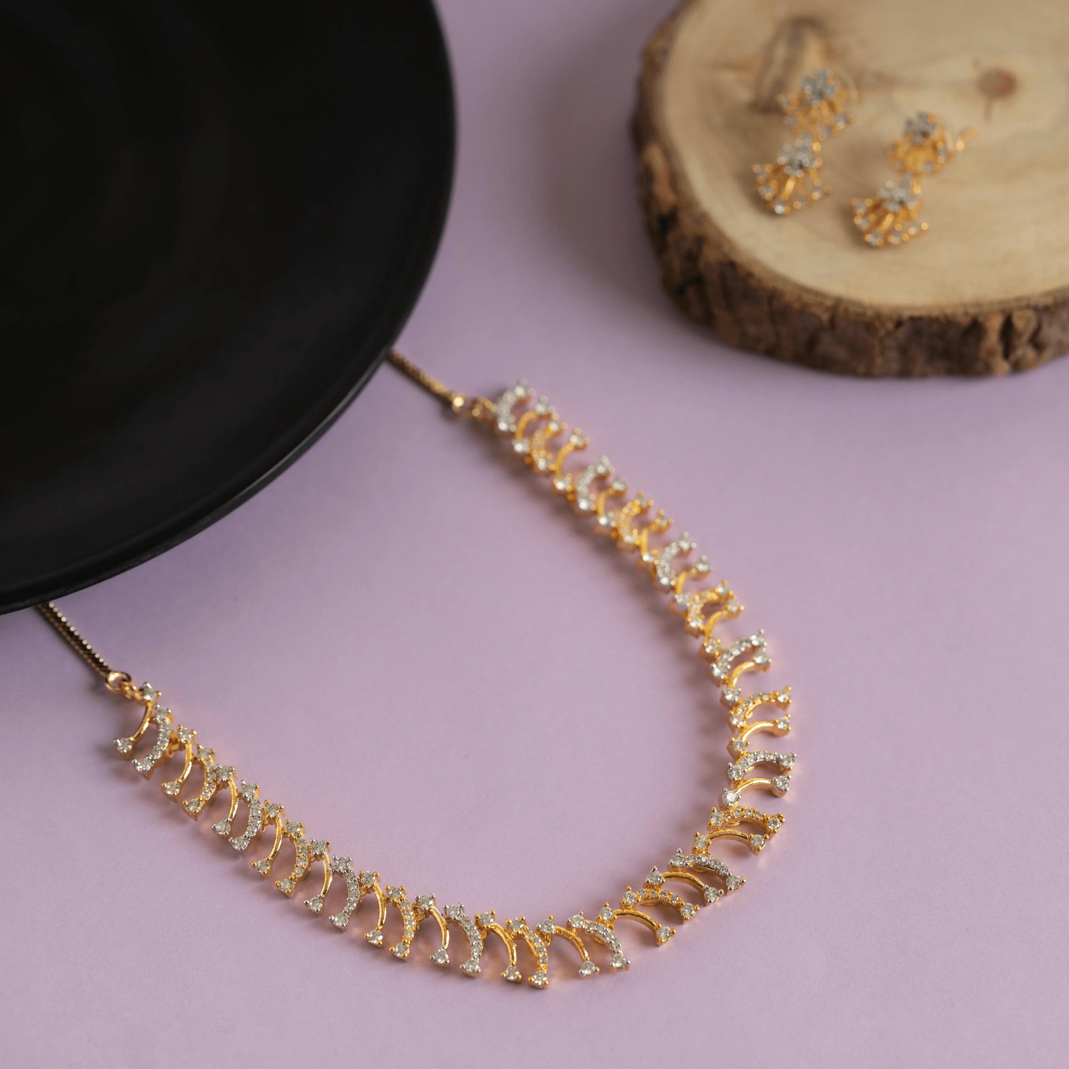 Set of gold plated sparkling diamond necklace and earring - Rukhmani