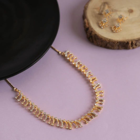 Set of gold plated sparkling diamond necklace and earring - Rukhmani