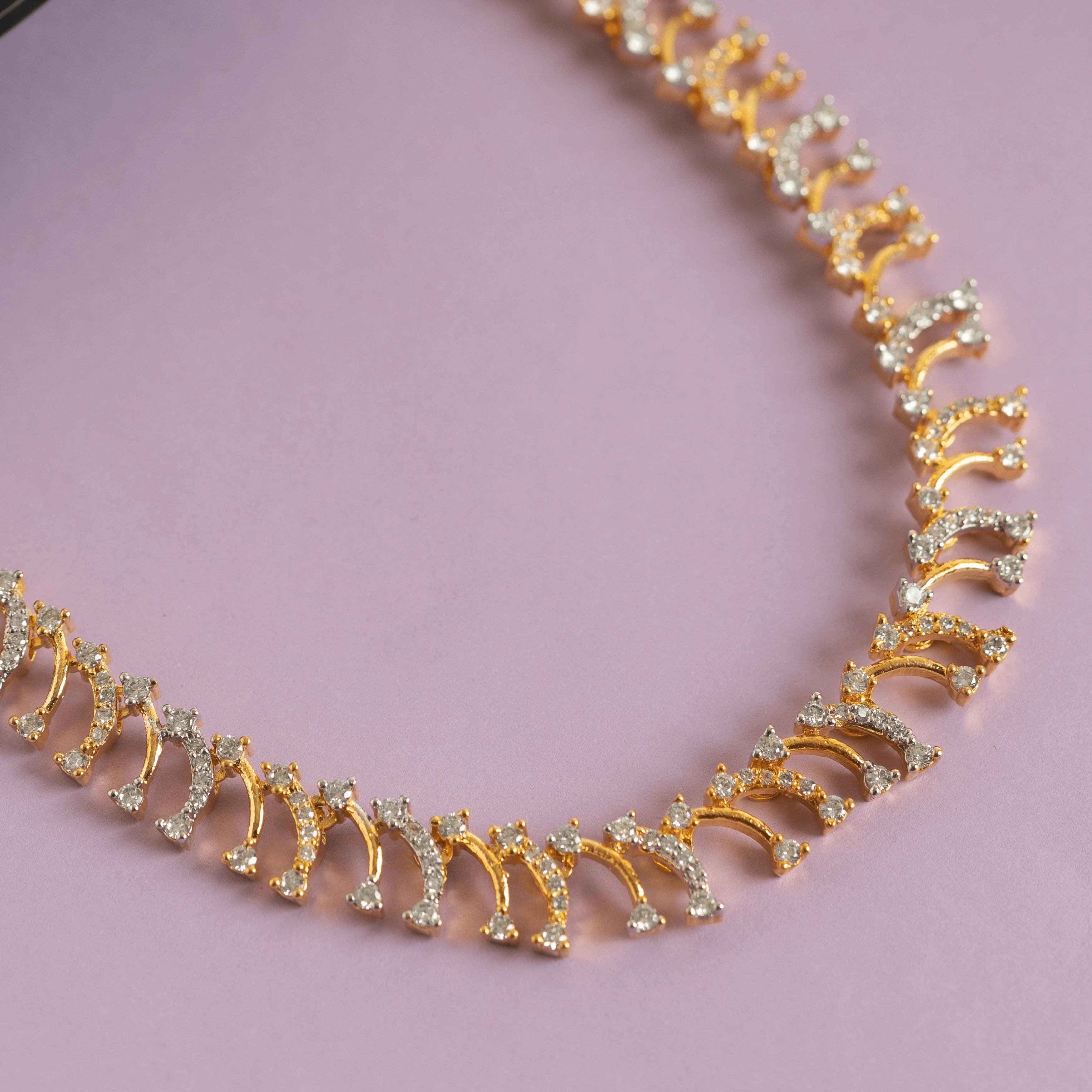 Set of gold plated sparkling diamond necklace and earring - Rukhmani