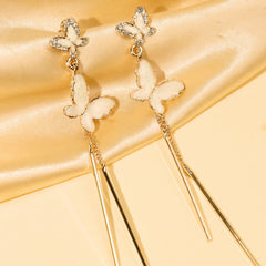 Butterfly Flutter Strings Gold Plated Earrings With Diamonds - Rukhmani