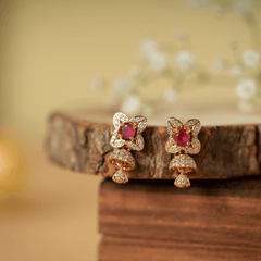 Gold Finish Zirconia and Dark Pink Stone Jhumki Earrings - Rukhmani