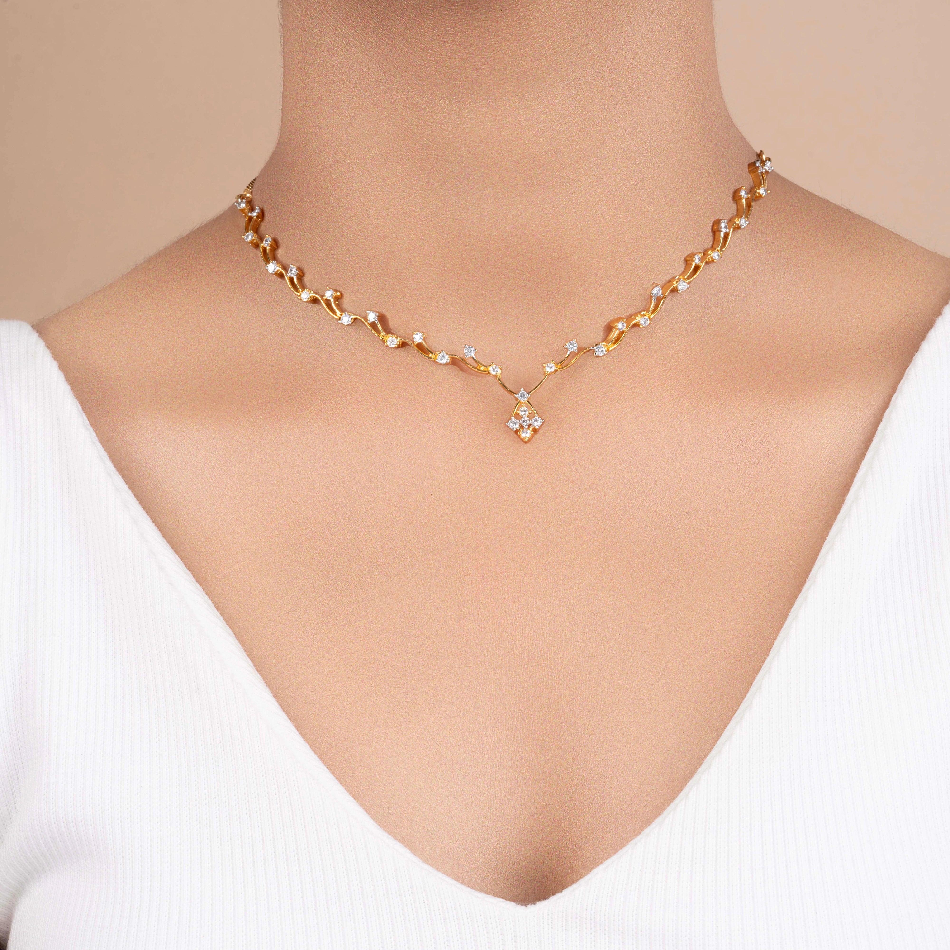 Set of gold plated unique diamond necklace and earring - Rukhmani